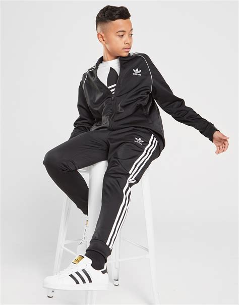 cheap adidas trackies|Adidas originals tracksuits.